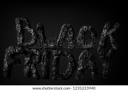 Creative 3d handmade foil lettering Black Friday against dark background