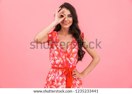 Image of amazing young happy woman isolated over pink background wall showing okay gesture.
