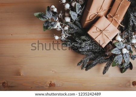 Christmas composition. Christmas gift on wooden background. Flat lay, top view, copy space