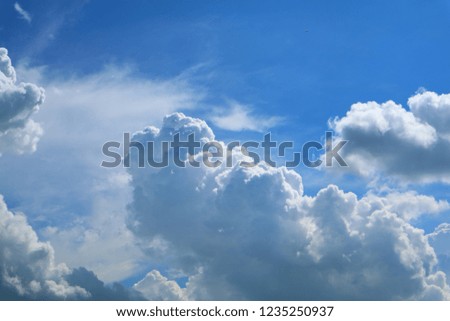 Beautiful blue sky background with white clouds. ky and clouds during the daytime in the summer. white fluffy clouds in the blue sky.