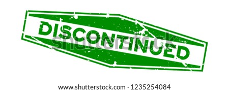 Grunge green discontinued hexagon rubber seal stamp on white background Royalty-Free Stock Photo #1235254084