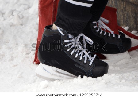 Men's hockey skates on a white background