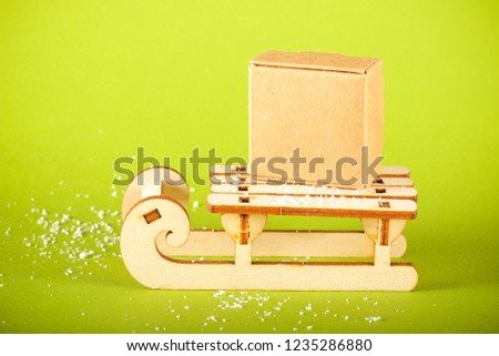 sledge winter decorative stand on a bright background