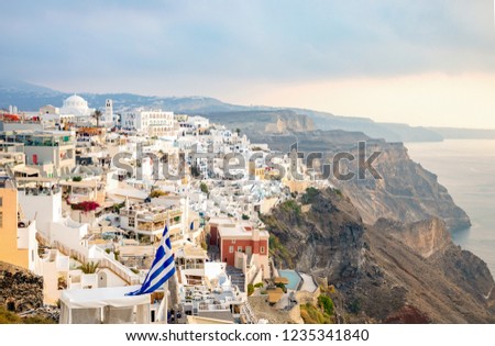 Panoramic view Traditional famous white houses and churches in Thira town on Santorini island in Greece