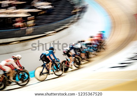 Indoor track cyling racing. Blur Background