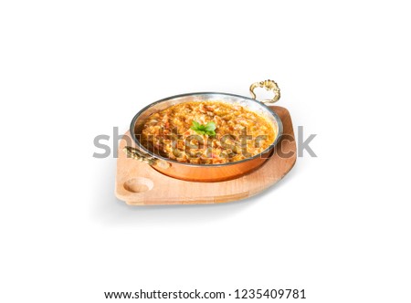 Traditional Tomato and Peppered Eggs Omelette, White Background, with clipping path included (TR: Domatesli Biberli Menemen ) Royalty-Free Stock Photo #1235409781