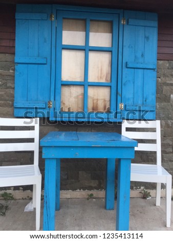 window, table and chairs