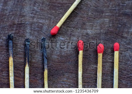 Matches on wooden floor