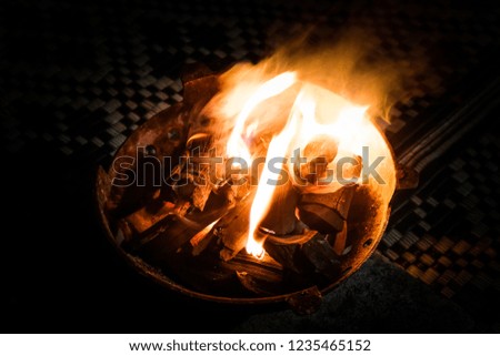 closed up charcoal burning fire in stove bonfire