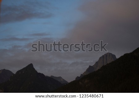 Austria Mountain Alps with clouds and mist late afternoon towards Sunset and sunrise