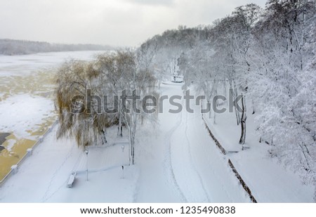 Winter in Gomel. Belarus. Embankment of the river Sozh near the city park. View from the pedestrian bridge