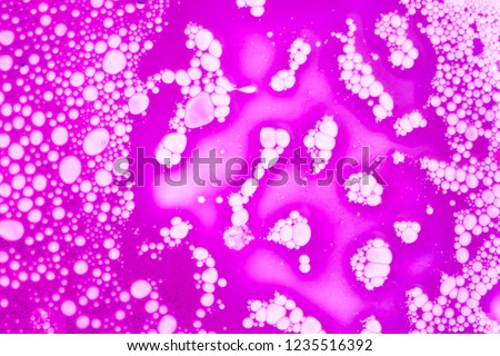 Beautiful Multicolored abstract background texture with bubbles. Bright and festive pictures for decoration and design. Spray Paint. Pink bubbles on white background