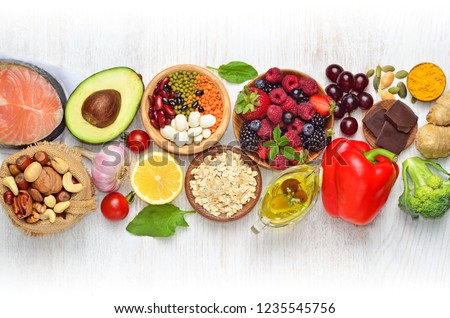 Selection of nutritive food - heart, cholesterol, diabetes. Flat lay, top view, copy space. Royalty-Free Stock Photo #1235545756