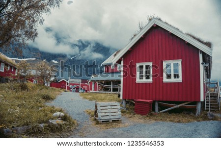 
Lofoten islands is an archipelago in the county of Nordland, Norway. Distinctive scenery with dramatic mountains and peaks, open sea and sheltered bays and red fishing huts, called rorbu. 