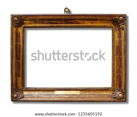 Picture gold wooden frame for design on white isolated background with nail and shadow