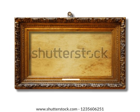 Picture gold wooden frame for design on white isolated background with paper