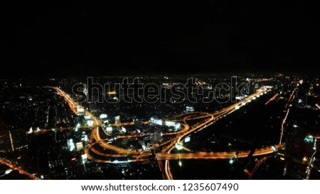 Cityscape of Bangkok Downtown at Night, Aerial urban View of Bangkok Expressway and City at Night from the  Baiyoke Sky Tower, Bangkok - Thailand