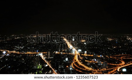 Cityscape of Bangkok Downtown at Night, Aerial urban View of Bangkok Expressway and City at Night from the  Baiyoke Sky Tower, Bangkok - Thailand