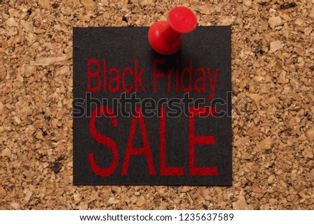Mural message. Reminder of Black Friday. Red thumbtack. Text: Black Friday Sale