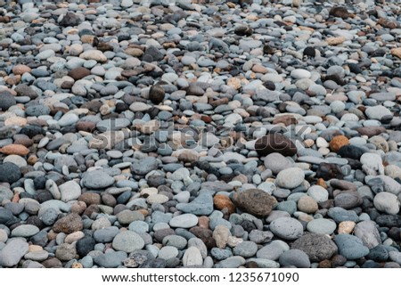 pebble stone beach - stones at ocean coast