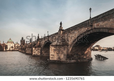 Charles Bridge over Vltava river. Prague old town, Czech Republic. Vintage stylized photo with tonal filter effect