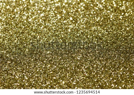 Macro gold glitter bokeh abstract background