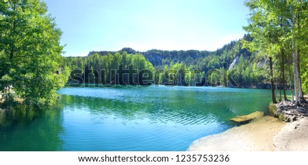 Adršpach-Teplice Rocks in Czech Republic. Piskovna Lake. Blue lake in the mountains. High resolution picture.