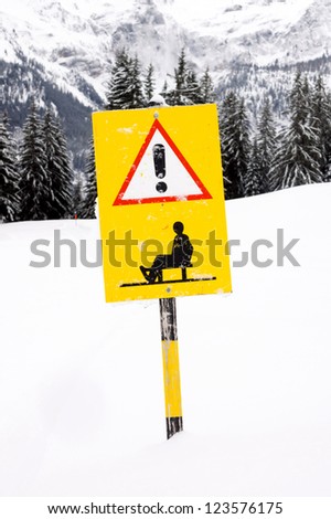 Sled route warning sign in the mountains