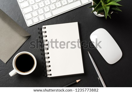 Business accessories on dark background with copy space