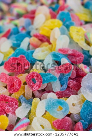 assortment colorful gummy candies at market (selective focus)