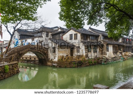 Canals of the little town of Zhouzhuang, China (translation: stone bridge)
