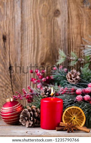 Christmas greeting card. Festive decoration on wooden background. New Year concept. Copy space.  Flat lay. Top view.