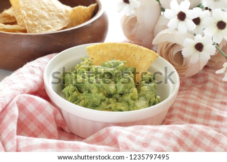 Mashed Avocado sauce and taco chips for dipping food