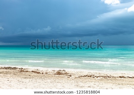 Miami south beach with storm approaching the sand