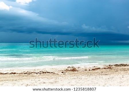 Miami south beach with storm approaching the sand