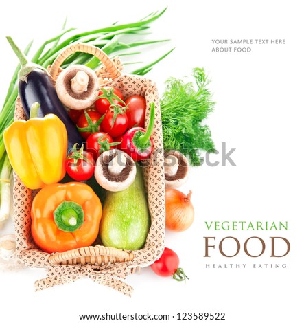 fresh vegetables with leaves in the basket isolated on white background Royalty-Free Stock Photo #123589522