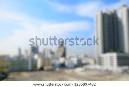 blurred​ picture​ of​ cityscape view, view​ of​ building​ in​ bangkok, background.