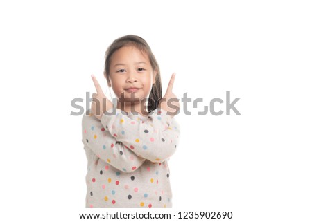 Cute kid southeast asian girl age 7 years in acting isolated on white background