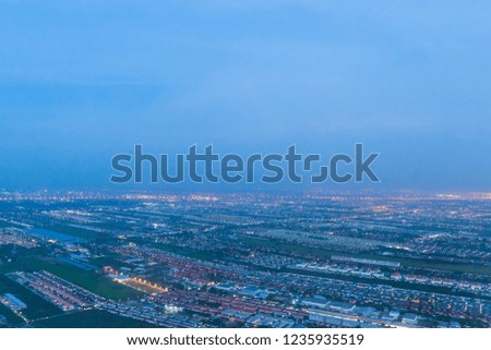 High view on airplane, with beautiful city night sky background.