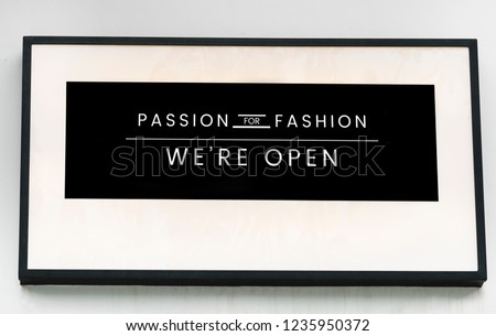 Minimal sign mockup for a fashion boutique