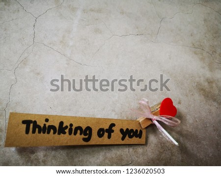Thinking of you written words on the wall