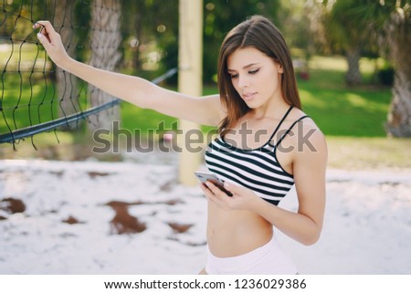 young and beautiful girl athlete posing for a photo