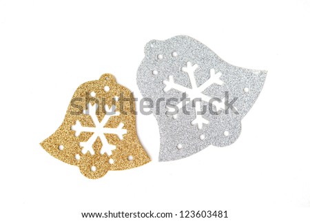 Silver and Gold bells in snowflake signs on white background