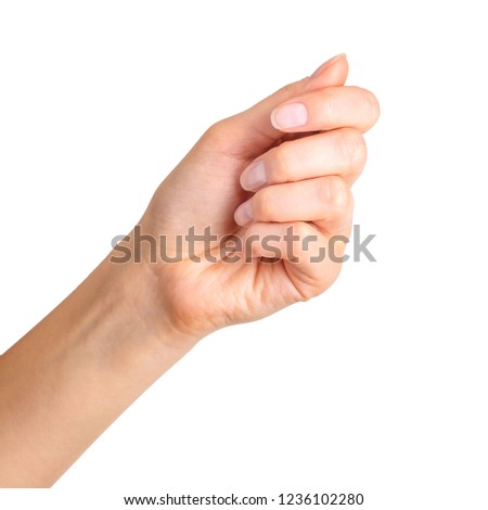 Woman hand holding something with two fingers. Isolated with clipping path.