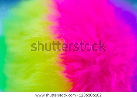 Abstract background in bright green, pink and blue colors. Fluffiness effect.
