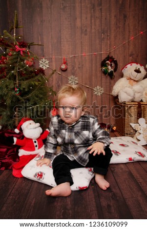 Little boy in a Christmas atmosphere