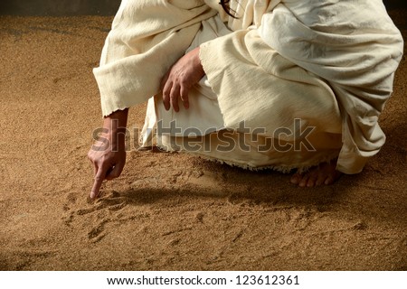 Jesus Writing on the sand with his finger Royalty-Free Stock Photo #123612361