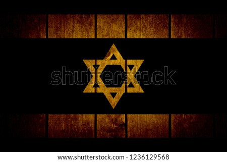 Flag of Israel on a wooden old background
