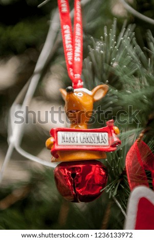 Closeup of australian kangaroo hanging from a decorated Christmas tree