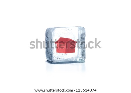 House frozen in ice cube Royalty-Free Stock Photo #123614074